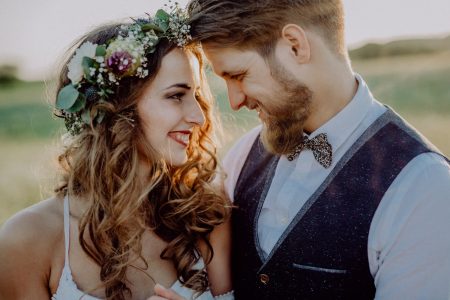 beautiful-bride-and-groom-at-sunset-in-green-nature-.jpg